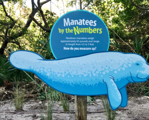 Florida Beach Resort Manatee shaped intepretive panel