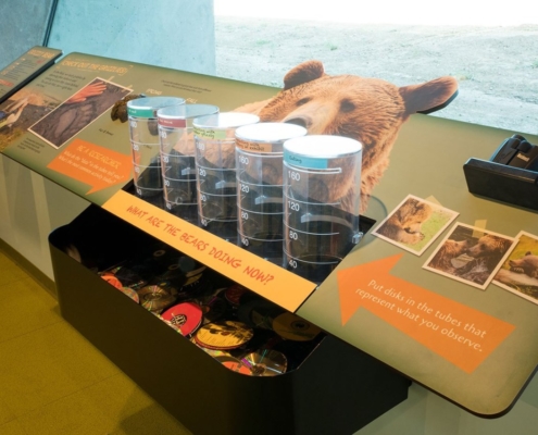 Oakland Zoo multi-interactives attached to exhibit panels