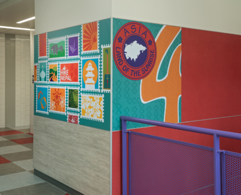 Pomeroy Elementary School wall panels featuring bright vivid cultural graphics