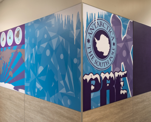 Pomeroy Elementary School wall panels featuring bright vivid cultural graphics