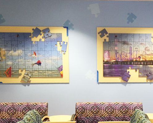 Texas Children's Hospital puzzle like wall panels featuring kites and puzzle pieces attached seperately of the main panel