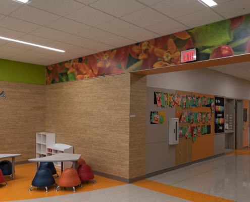 Thornton Elementary School wall mural strip near ceiling featuring Texas wildflowers